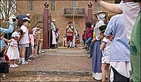 Bob Albergotti leads a Virginia militia from the Capitol, headed down Duke of Gloucester Street.