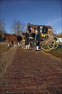 In Philadelphia, Thomas Jefferson hands George Wythe his draft for a Virginia constitution.