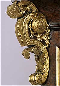 Gilt metal scroll