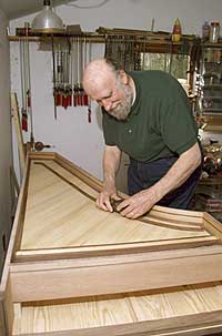 Redstone’s diminutive Claremont, Virginia, workshop gives him all the space he needs to plane, drill, and pound fine woods and brass bits into authentic re-creations of eighteenth-century harpsichords. - Dave Doody