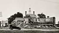 The old high school comes down to clear the way for the reconstructed Palace.